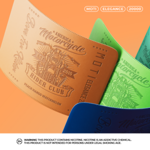 Close-up view of colorful leather-textured product packaging featuring embossed designs with a motorcycle theme, labeled "MOTI Elegance 20000" and flavor "Peach Mango Watermelon," with a nicotine warning at the bottom.